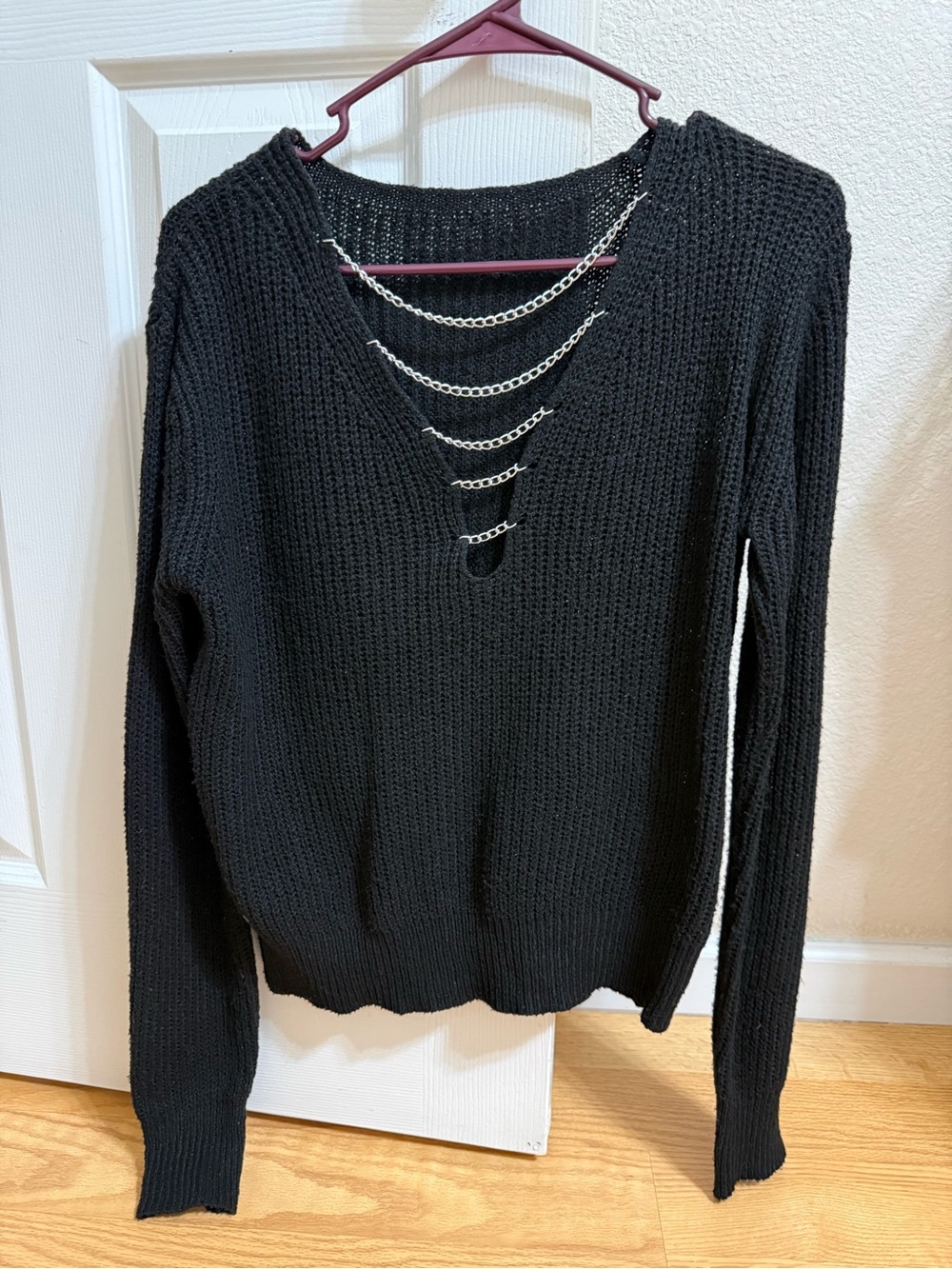 SHEIN Black V-Neck Sweater with Silver Chain Accent